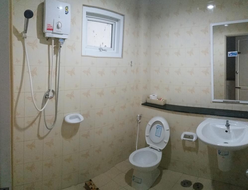 Charoen Apartment Hotel Транг Экстерьер фото